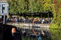 People having lunch at a tavern on the canal banks at Regent`s Canal next to Paddington in Little